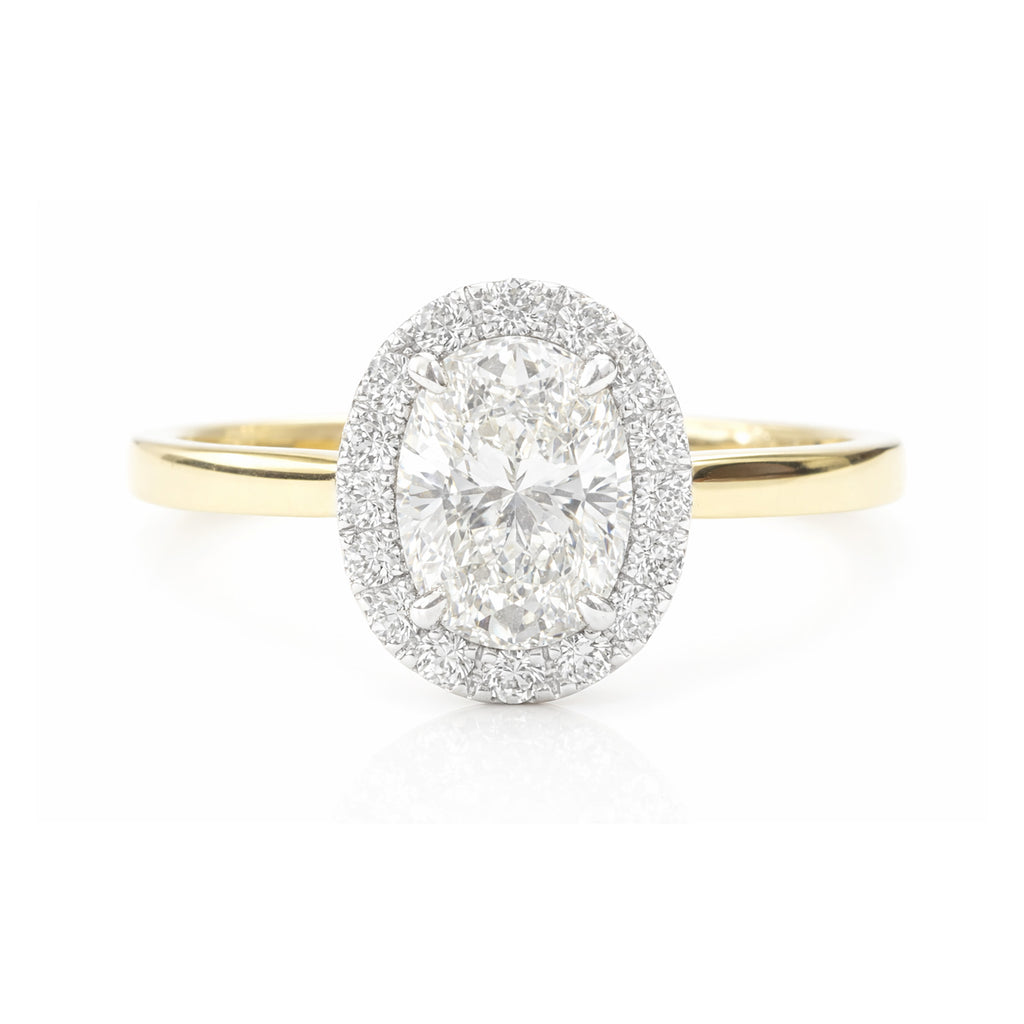 18K ほぼ無色G ダイヤモンドリング 1.049ct VVS2 オーバルカット
