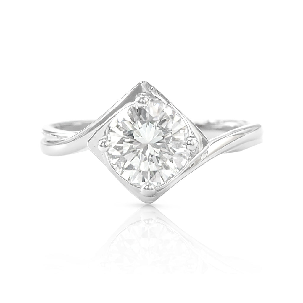 18K Jほぼ無色 ダイヤモンドリング 0.66ct VS1 ラウンド